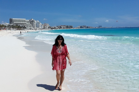 Walking on the hotel Westin beach with a view to Cancun downtown