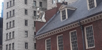 View of the Old State House, Boston with new modern buildings behind it.