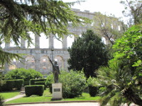 The Pula Arena is the name of the amphitheatre located in Pula, Croatia. The Arena is the only remaining Roman amphitheatre to have four side towers and with all three Roman architectural orders entirely preserved.