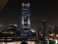 Image of Telkom Landmark Tower at night with all lights.