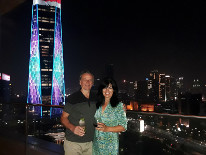 My wife and I and a view from 20th floor of Four Seasons hotel, Jakarta