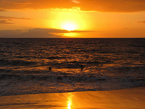 An image of sunset at Maui beach