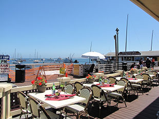 The image of a small restaurant on the wharf