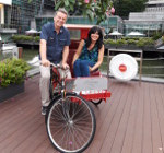 Singapore, me and my wife in the Traditional rikshaw transport on streets. 