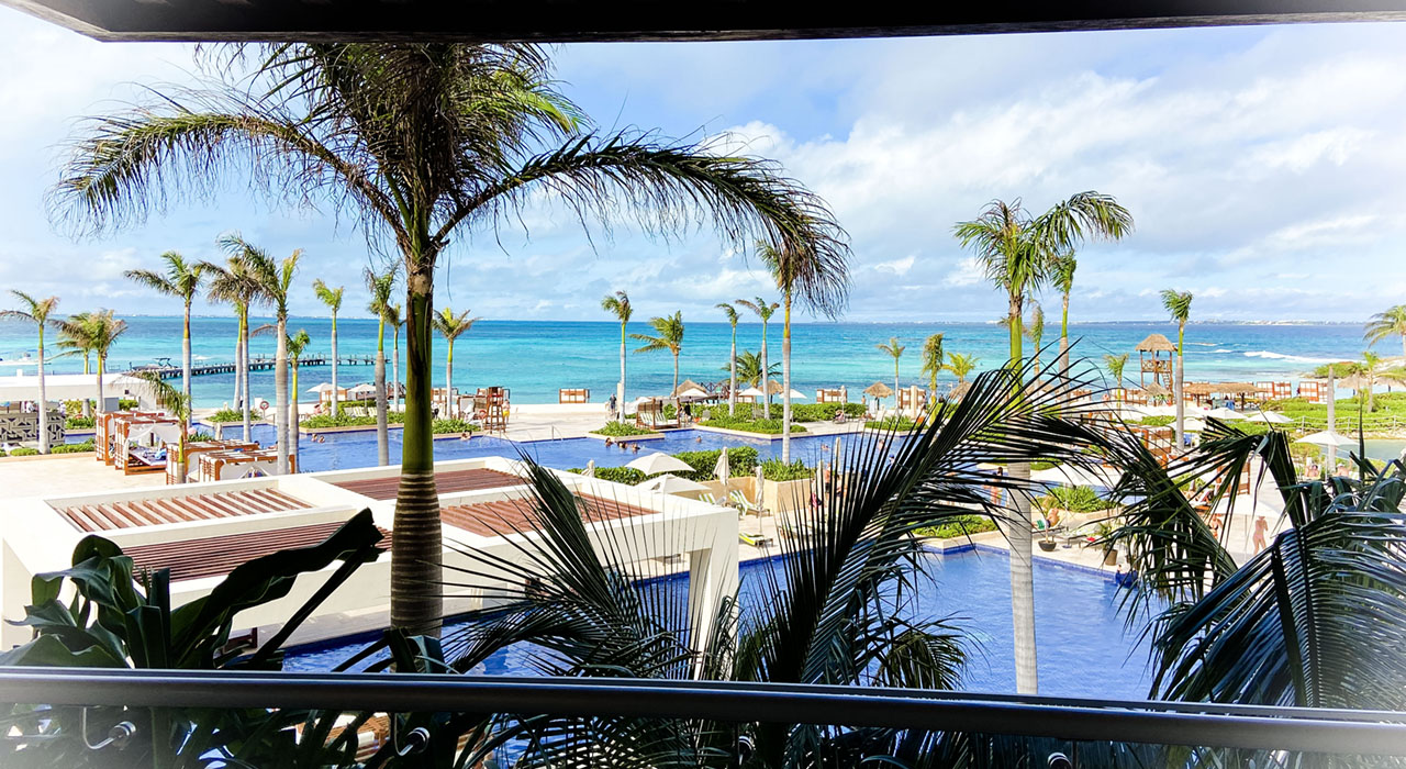 A beautiful view from the balcony of the hotel to the beach front